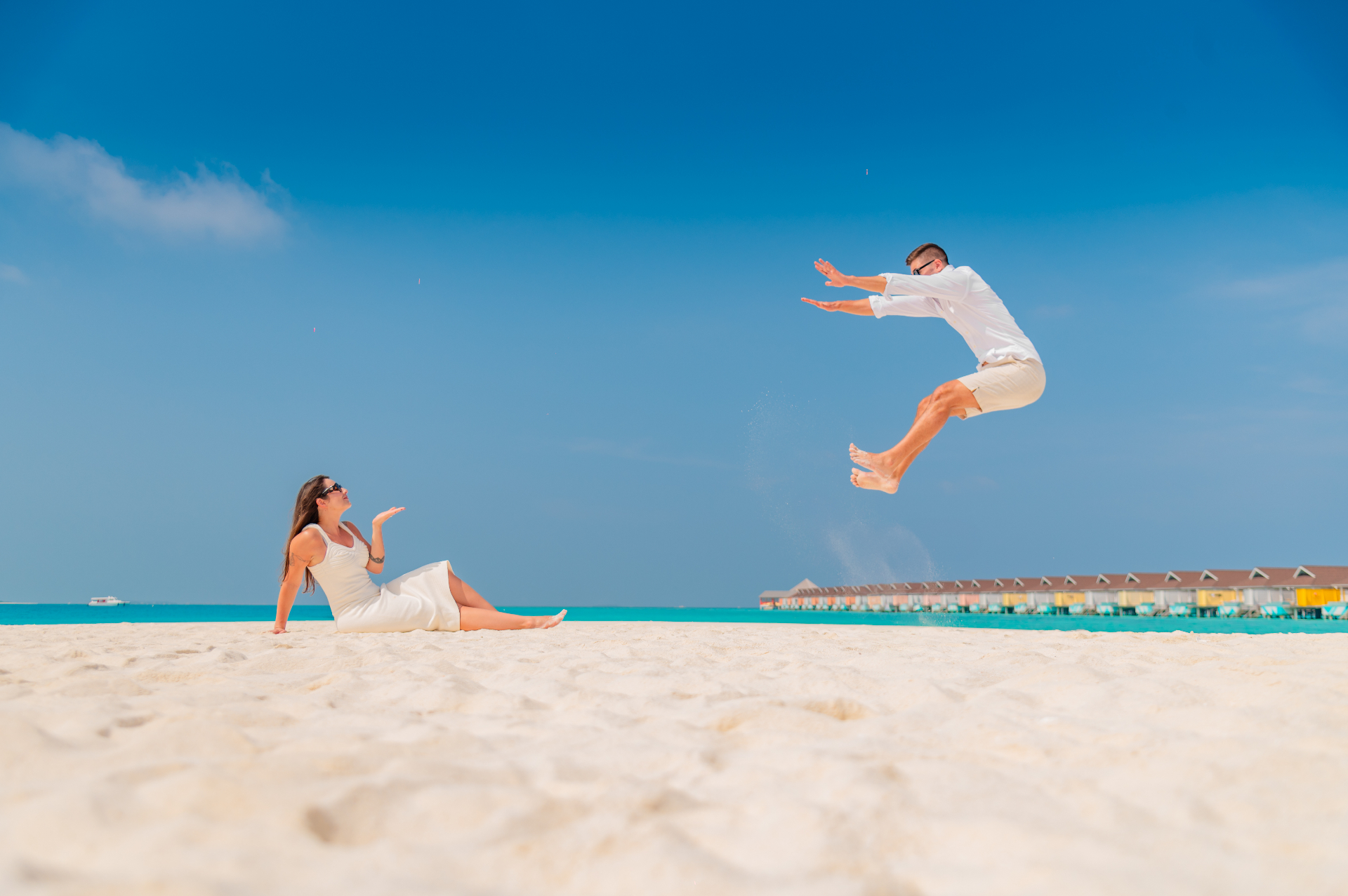 Jumping for joy on the sand